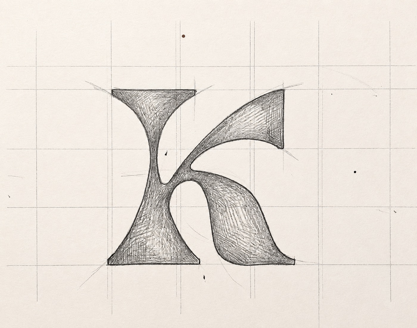 Croquis de construction du wordmark Koryaa : tracé du K sur grille au crayon